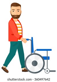 Man pushing wheelchair.