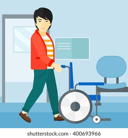 Man pushing wheelchair.