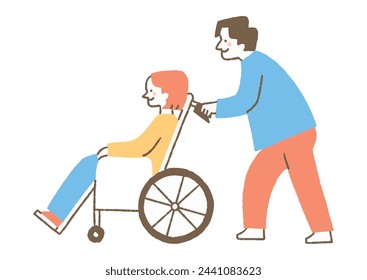 Man pushing a wheelchair with a young woman riding in it_Color