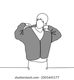 man puts on the hood of his hoodie - one line art vector. Handmade vector not AI
