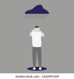 Man puts on a hood in the rain