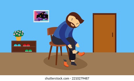 Man putting on boots in the room