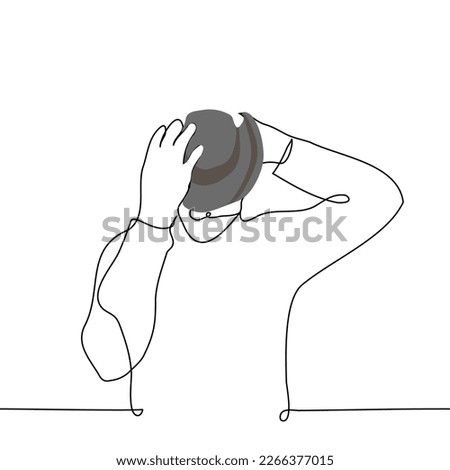 man putting on cowboy hat - one line drawing vector. concept cowboy