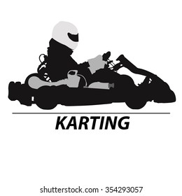 Man racing on sport kart in helmet