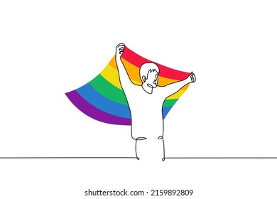 man raised a lgbt flag above him that flutters in the wind - one line drawing vector. the concept of gay pride parade, protecting and defending the rights of the lgbtq+ community