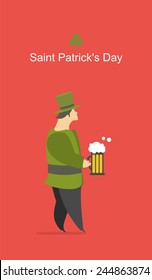 man raises his glass of beer on the feast of St. Patrick