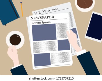 The man read newspaper and drink coffee in the office