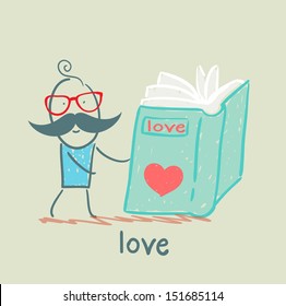 man reading a book about love