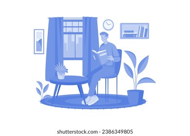 Man Reading Book At Home