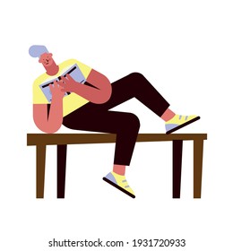 man reading book table study