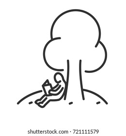 A man is reading a book under a tree