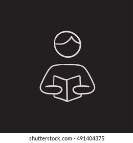 Man reading book vector sketch icon isolated on background. Hand drawn Man reading book icon. Man reading book sketch icon for infographic, website or app.