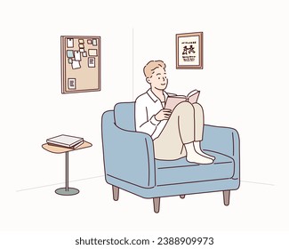 man reading book while sitting on blue sofa in room. Hand drawn style vector design illustrations.