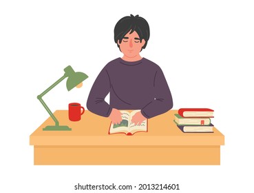 Man reads book at table. Guy reading in library. Education concept. University student studiees at desk.