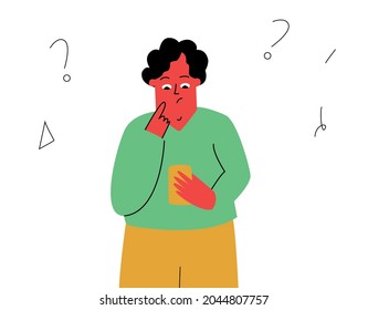 A man reads a message on his phone. A man with a puzzled, questioning expression on his face. A man with a phone.