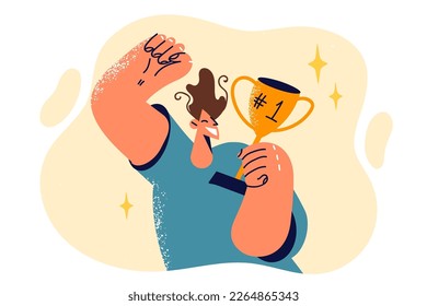 Man received golden cup of winner rejoices at long-awaited victory and makes joyful waves of hand. Concept leadership qualities and winning competition among students or employees of company 