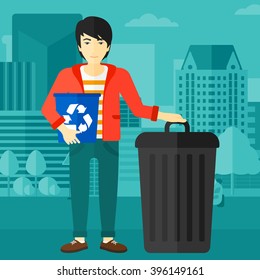 Man with recycle bins.