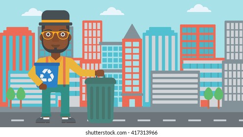 Hombre con papeleras de reciclaje.