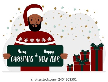 A man in a red cap holds a Merry Christmas and Happy New Year greeting card.