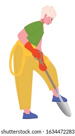 A man in red gloves digs a shovel hole.