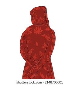 Man in red hoodie, arms crossed, patterned clothing.