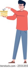A man in a red shirt is holding a box