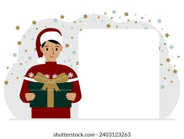 A man in a red sweater is holding a large gift box with a bow. New Year or Christmas.