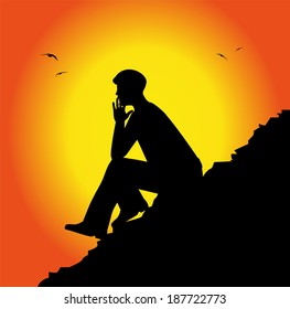 man  reflects in the sunset