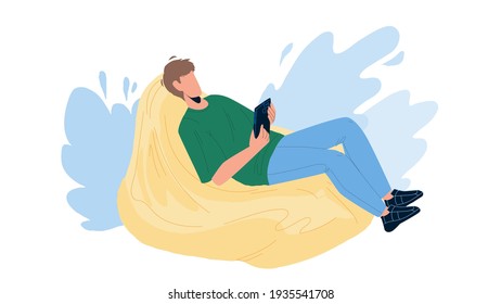 Man Relax On Bean Bag And Playing On Phone Vector. Young Boy Have Leisure Time And Relax On Soft Sofa. Character Freelancer Businessman Relaxing After Work Flat Cartoon Illustration