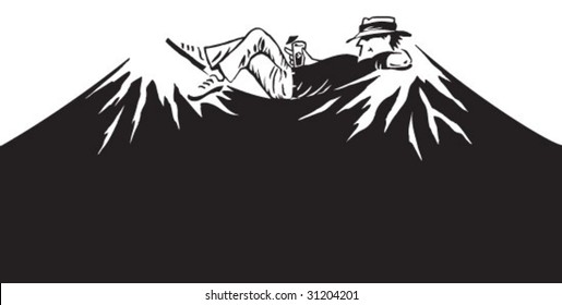Man relaxing between mountain peaks