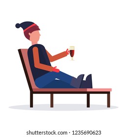 man relaxing on lounge chair at resort guy drinking mulled wine winter vacation concept flat isolated