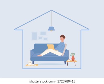 Man relaxing on the sofa in the living room of the home and working online with a computer laptop, a cat lying near him. Illustration about stay home and safe.