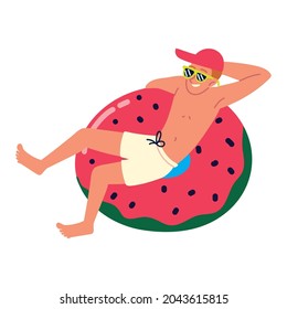 man relaxing on the watermelon float