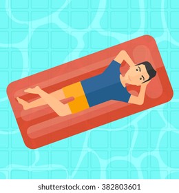 Man relaxing in swimming pool.