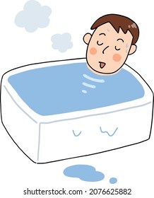 A man relaxing in a warm bath