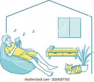 A man relaxing while playing games at home
