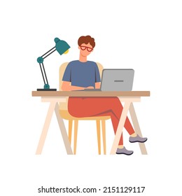 man at remote work at his desk working at a laptop