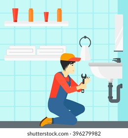 Man repairing sink.