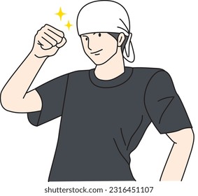 A man in a restaurant doing a fist pump pose.