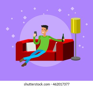 Man resting at home, laying on sofa and drinking beer, looking in smartphone