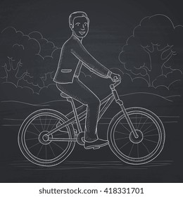 Mann, der Fahrrad fährt.
