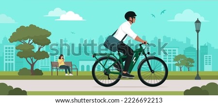 Man riding an eco-friendly electric bike in the city street, sustainable mobility concept