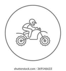 Man riding motocross bike line icon.