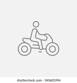 Man riding a motorcycle line icon for web, mobile and infographics. Vector dark grey icon isolated on light grey background.