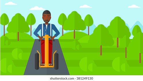 Man riding on electric scooter.