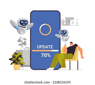 man with robots helpers updating operating system update process install new software on smartphone artificial intelligence