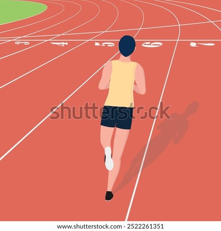 A man running on a track. Rear view of running track