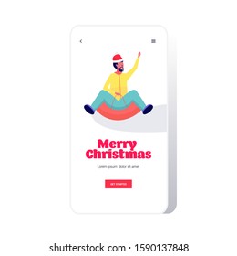 man in santa hat sledding on snow rubber tube merry christmas happy new year winter holidays activities concept african american guy having fun smartphone screen online mobile app full length vector