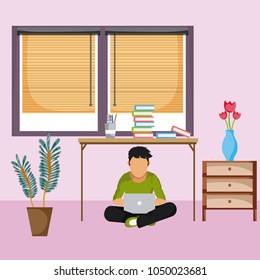 Man seated with laptop at home