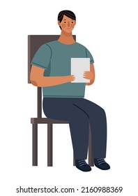 man seated with notebook character